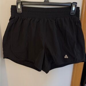Black athletic shorts.